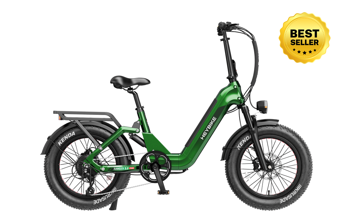 Heybike Ranger 3.0 Pro folding fat-tire electric bike with 750W rated rear-hub motor, KENDA 20 by 4 inch fat tires with puncture protection, hydraulic disc brakes, Shimano Altus 8-speed gearing, hydroformed aluminum folding frame, hydraulic front suspension, TFT color display, NFC Tap & Go unlocking, integrated turn signals, available in Ruby Red, Sapphire Blue, or Emerald Green