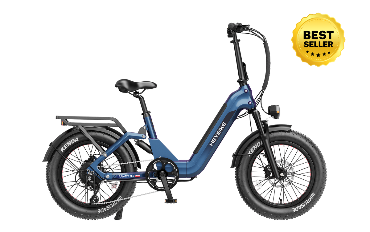 Heybike Ranger 3.0 Pro folding fat-tire electric bike with 750W rated rear-hub motor, KENDA 20 by 4 inch fat tires with puncture protection, hydraulic disc brakes, Shimano Altus 8-speed gearing, hydroformed aluminum folding frame, hydraulic front suspension, TFT color display, NFC Tap & Go unlocking, integrated turn signals, available in Ruby Red, Sapphire Blue, or Emerald Green