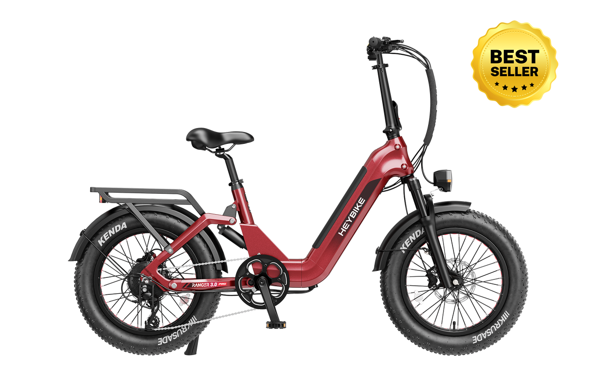 Heybike Ranger 3.0 Pro folding fat-tire electric bike with 750W rated rear-hub motor, KENDA 20 by 4 inch fat tires with puncture protection, hydraulic disc brakes, Shimano Altus 8-speed gearing, hydroformed aluminum folding frame, hydraulic front suspension, TFT color display, NFC Tap & Go unlocking, integrated turn signals, available in Ruby Red, Sapphire Blue, or Emerald Green
