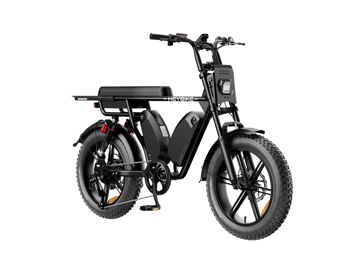 Heybike Saturn moped-style commuter e-bike: 52V 1000W continuous / 1800W peak hub motor, 95 Nm torque, single or dual-battery configuration, hydraulic disc brakes, full suspension with 140 mm front travel, turn signals, TFT color display, UL 2849 certified