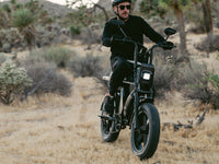 Heybike Saturn moped-style commuter e-bike: 52V 1000W continuous / 1800W peak hub motor, 95 Nm torque, single or dual-battery configuration, hydraulic disc brakes, full suspension with 140 mm front travel, turn signals, TFT color display, UL 2849 certified