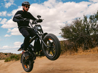 Heybike Saturn moped-style commuter e-bike: 52V 1000W continuous / 1800W peak hub motor, 95 Nm torque, single or dual-battery configuration, hydraulic disc brakes, full suspension with 140 mm front travel, turn signals, TFT color display, UL 2849 certified
