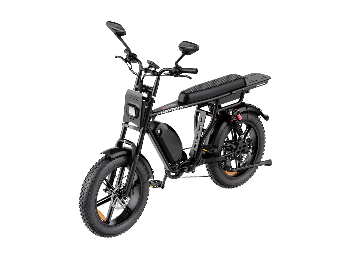 Heybike Saturn moped-style commuter e-bike: 52V 1000W continuous / 1800W peak hub motor, 95 Nm torque, single or dual-battery configuration, hydraulic disc brakes, full suspension with 140 mm front travel, turn signals, TFT color display, UL 2849 certified