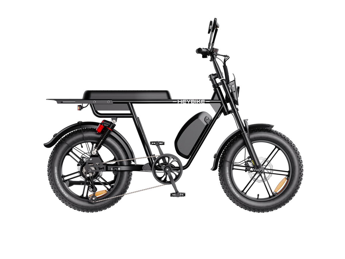 Heybike Saturn moped-style commuter e-bike: 52V 1000W continuous / 1800W peak hub motor, 95 Nm torque, single or dual-battery configuration, hydraulic disc brakes, full suspension with 140 mm front travel, turn signals, TFT color display, UL 2849 certified