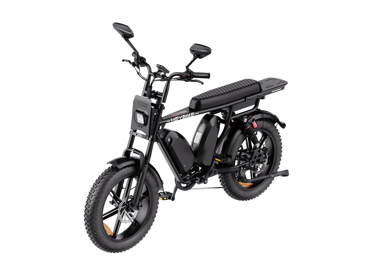 Heybike Saturn moped-style commuter e-bike: 52V 1000W continuous / 1800W peak hub motor, 95 Nm torque, single or dual-battery configuration, hydraulic disc brakes, full suspension with 140 mm front travel, turn signals, TFT color display, UL 2849 certified