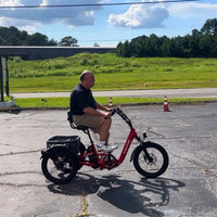 VTUVIA E-COZY electric trike on a paved path