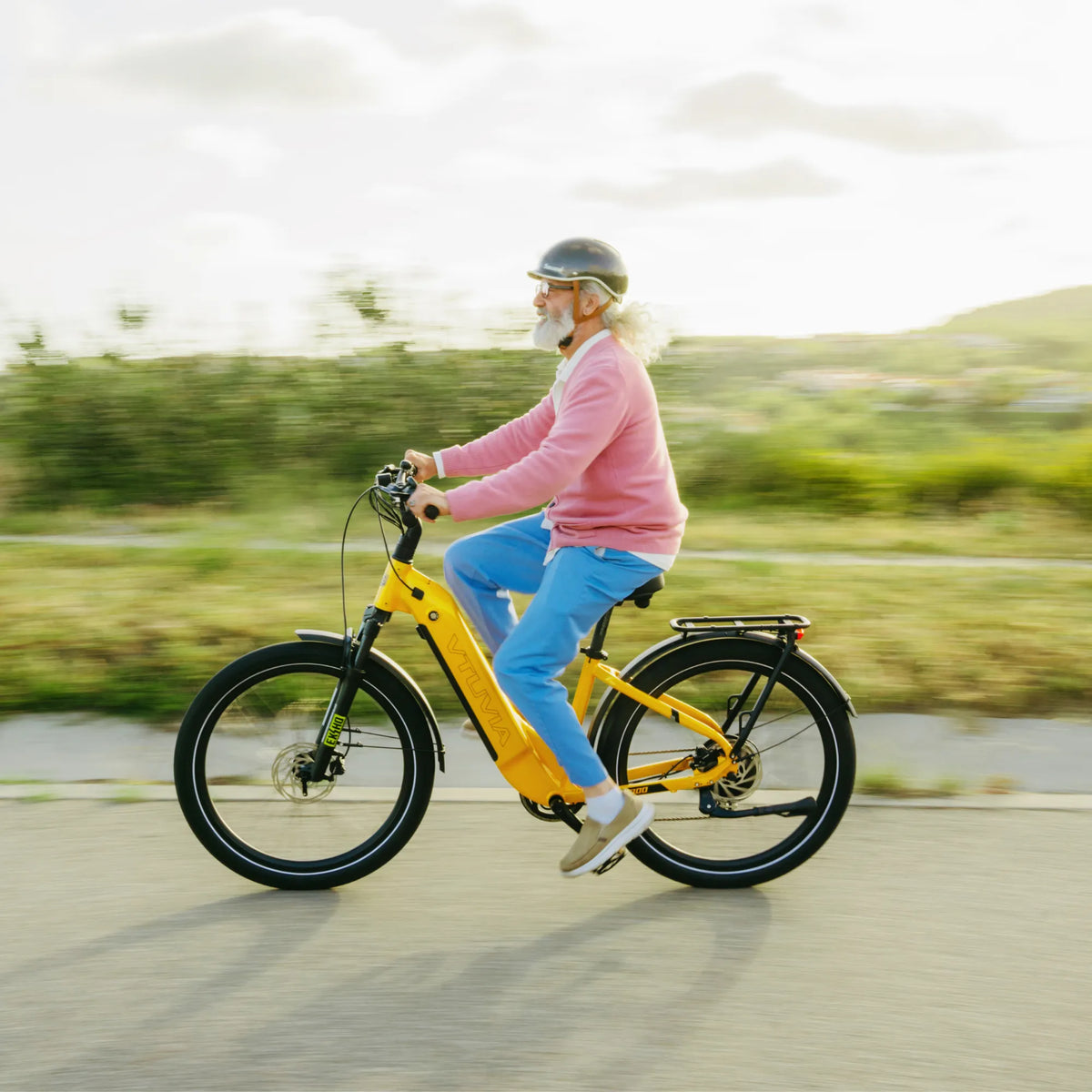 VTUVIA Zeal LT7 yellow commuter e-bike three-quarter view with front and rear equipment