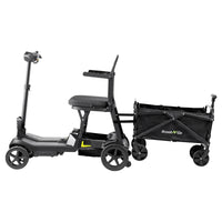 ScootNGo Lite black mobility scooter with yellow accents attached to cargo wagon