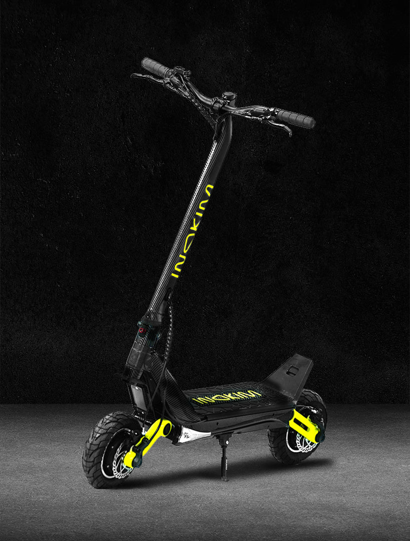 INOKIM OXO 2026 dual-motor folding electric scooter in carbon finish with hydraulic disc brakes and 10 inch tires.