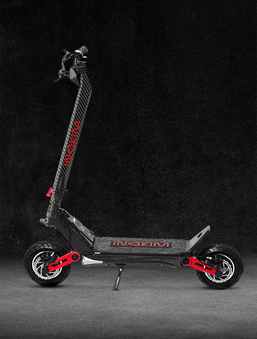 Red INOKIM OXO 2026 Special Edition showing the dual-motor flagship scooter frame and road stance.