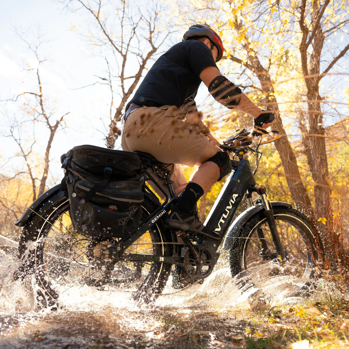 VTUVIA Gemini fat-tire electric bike riding on an outdoor route