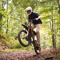 HappyRun G300 Pro 6500W peak motocross-format electric dirt bike: 50 mph top speed, 72V 30Ah battery, hydraulic 180/203mm disc brakes, inverted front fork, carbon steel frame, motocross-format tires, IPX5, off-road use only