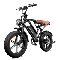 Front angle of the black CycHunter showing its headlight and fat tire