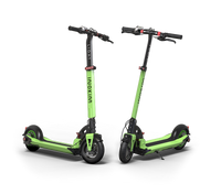 Green INOKIM Light 2 Super electric scooter with 8.5 inch pneumatic tires and a lightweight folding frame.
