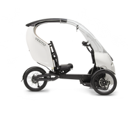 ENVO Veemo SE roofed electric velomobile trike in a studio side view.